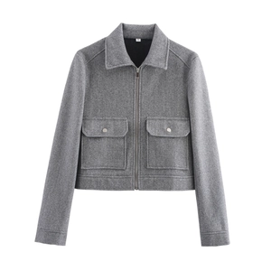 Women's dark grey tweed jacket with long sleeves, front pockets, and metal zipper closure