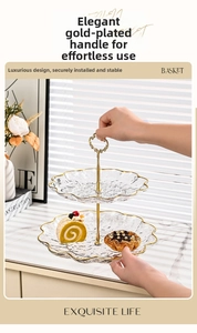 Close-up of double-tier hammer pattern glass fruit tray with gold-plated metal handle