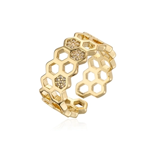 Detail shot of the gold plated honeycomb open ring with sparkling zircon inlays