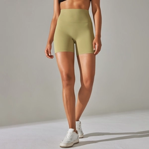 Side view of high-waisted olive green fitness shorts on a model with premium fabric texture
