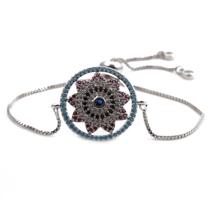 Detail of silver mandala evil eye bracelet with blue zircon and adjustable chain