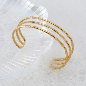 Minimalist gold plated stainless steel open bangle with three-layer wavy hammered texture