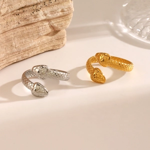 Minimalist snake-shaped stainless steel open ring with engraved scale textures in gold and silver