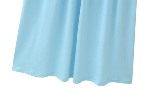 Detail of light blue mesh patchwork hem with professional double-needle stitching