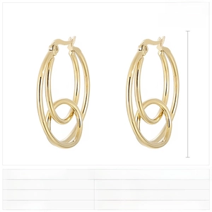 Detail view of gold-plated stainless steel knot earrings with double loop geometric design