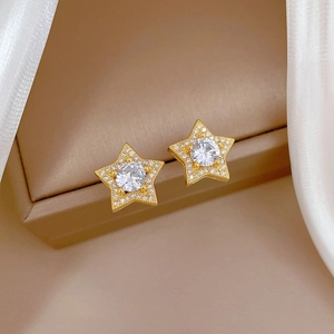 Elegant gold five-point star stud earrings with white rhinestones and a center zircon
