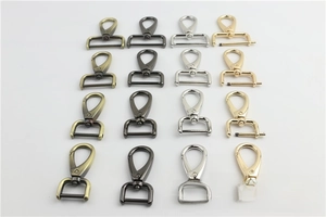 Detail of metal swivel snap hooks in four finishes for bag strap hardware repair