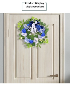 Blue roses and porcelain patterned plates on a floral wreath with checkered ribbon bow