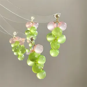 Grape-shaped floral tassel earrings with green and pink resin beads on gold studs