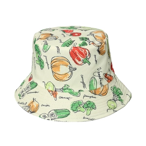 Cream bucket hat with colorful hand-drawn vegetable patterns and English script names