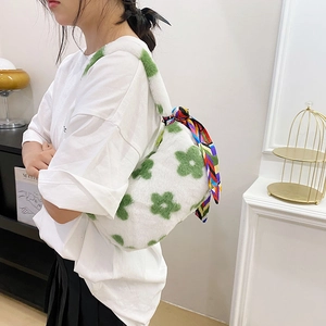 Cute white plush shoulder bag with green floral pattern and colorful silk scarf detail