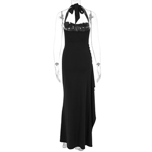 Detail of black backless evening dress featuring a halter neck bow and elegant tie-up back