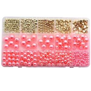 770pcs pink DIY jewelry kit with faux pearls and gold beads in a 15-compartment box