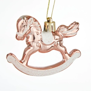 Décoration de Noël cheval à bascule or rose avec paillettes blanches sur fond blanc