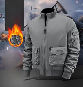 Detail of gray bomber jacket showing thick thermal fleece lining and ribbed cuffs