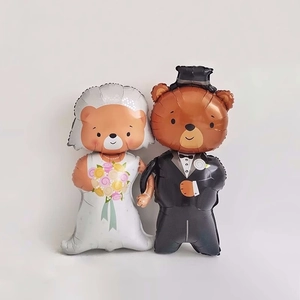 Detailed view of bride and groom teddy bear foil balloons for wedding party decor
