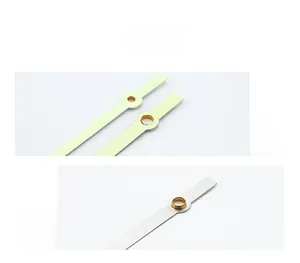 Detailed view of silver luminous metal clock hands with high-precision copper bushings