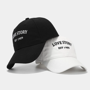 Classic cotton baseball cap with LOVE STORY embroidery in black and white colors