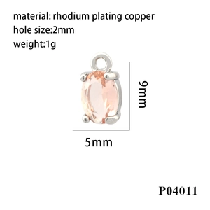 Macro detail of 18K gold plated oval pink zircon pendant with 9x5mm size specs