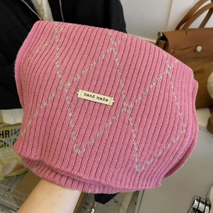 Pink chunky knit plaid scarf with handmade label for winter warmth and soft style