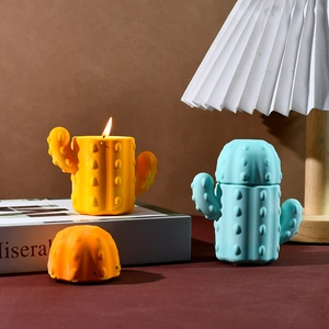 Macro shot of cactus-shaped storage candles with realistic flame and textured surface