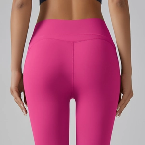 Detail of rose pink high waisted yoga pants with butt-lifting curved stitching seams