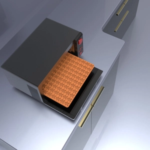 Orange silicone baking mat for Halloween candy and cookies inside a black oven