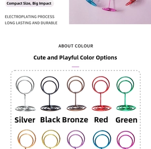 Detailed view of colorful heart metal card holders in various electroplated finishes