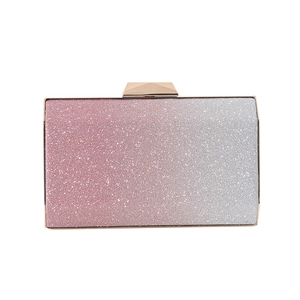 Sparkling pink and silver gradient evening clutch bag with gold geometric metal clasp