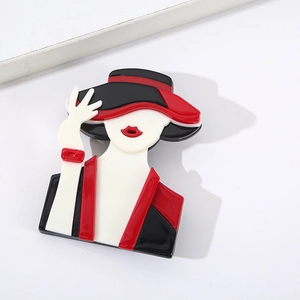 Detailed close-up of a modern acrylic brooch featuring a stylish cartoon girl design