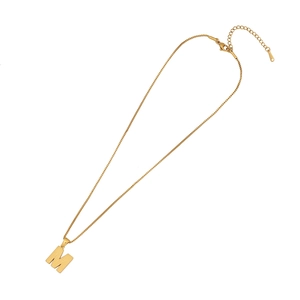 Polished gold stainless steel M-letter pendant necklace with box chain on white background