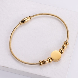 Elegant 18k gold plated stainless steel wire bracelet with charms and beads