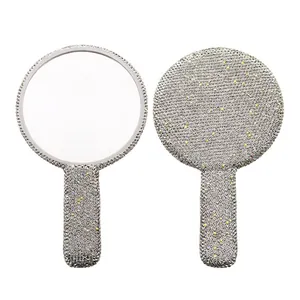 Portable heart-shaped hand mirror with shimmering silver rhinestones and foldable handle