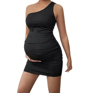 Slim fit one-shoulder maternity dress in black with flattering side ruching details