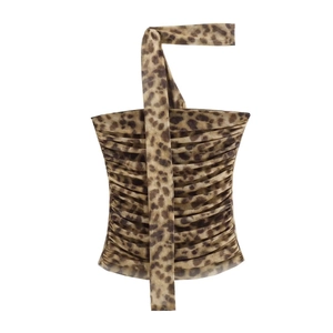 Detailed view of leopard print tube top featuring horizontal pleats and animal patterns