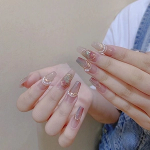 Handmade long ballerina press-on nails in nude pink with pearls and shell accents