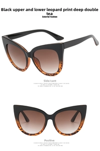 Close-up of cat eye glasses with black and leopard print frame and brown gradient lenses