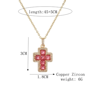 Detail of gold cross pendant with pink square zircon and copper chain measurements