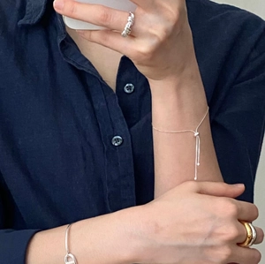 Minimalist S925 sterling silver snake bone slider bracelet with stacked rings and bangle