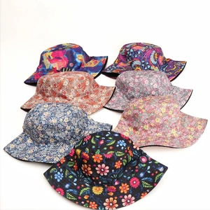 Ethnic style floral and leaf reversible bucket hats in multiple patterns and colors