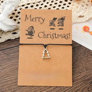 Christmas tree wish bracelet with silver alloy pendant and black braided rope on card