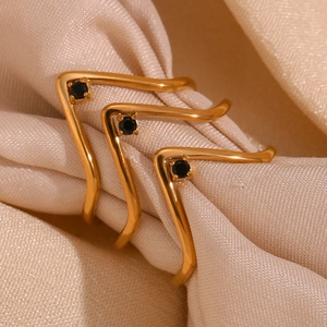 Elegant 18K gold-plated V-shaped chevron ring featuring micro-inset black gemstones