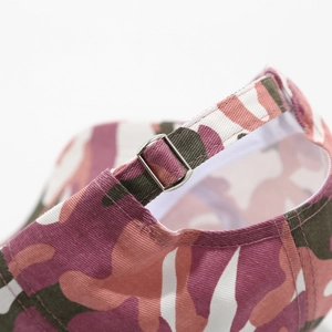 Detail of pink camouflage baseball cap with adjustable silver metal buckle closure