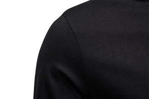 Close-up of shoulder stitching on a men's black cotton slim-fit V-neck long sleeve tee