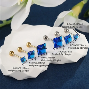 Macro shot of blue square zircon earrings in gold and silver finish with size parameters