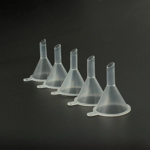 Detailed view of 5 small translucent PP plastic funnels for essential oil bottling
