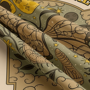Close-up detail of celestial sun and moon patterns on high-quality woven fabric tapestry
