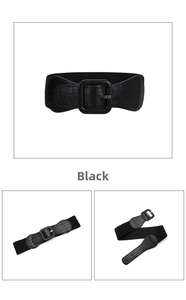 Detail of black wide elastic waist belt with faux crocodile leather and square buckle