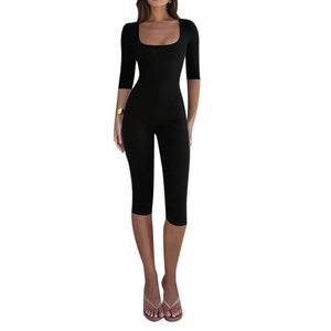 Combinaison moulante noire pour femme avec col rond et manches mi-longues