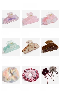 Detailed assortment of pink acetate heart hair claws and cherry print scrunchies set
